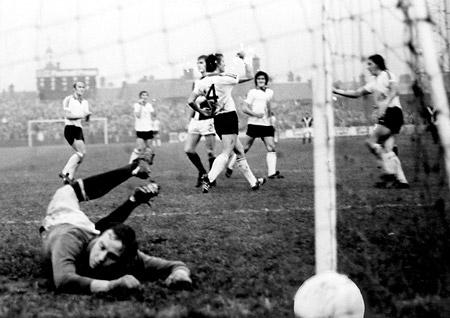 01/11/75 - York City 1, Sunderland 4: All the despair and frustration of Graeme Crawford the York City goalkeeper as he is beaten by Tony Towers' penalty for Sunderland's third goal, with Towers (No 4) showing his delight in the background.