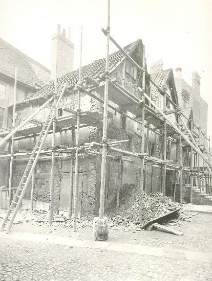 Restoration work is carried out at the Merchant Adventurers' Hall in 1938.
