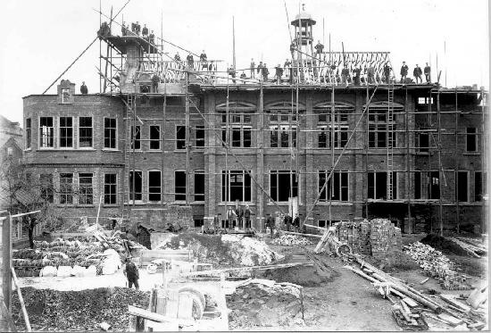 Construction work is carried out on Bootham School's new main block in 1900, following the fire of 1899.