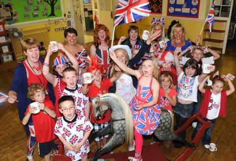 Pupils and staff from Poppleton Road Primary School enjoy their jubilee party