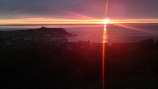 A photo taken from Oliver's Mount at Scarborough - summer solstice sunrise. Picture: Walter Pollard