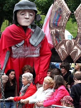 Giant puppets in the crowd at Ebor Vox