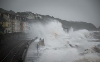 Storm Barra: Photo of huge waves crashing along the seafront at Dawlish, Devon, on December 6, 2021.