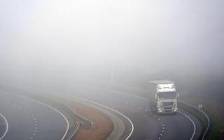 Photo via PA shows a foggy road.