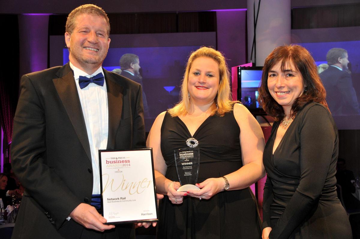 COMMUNITY FIRST: Network Rail, represented by Phil Verster and Michelle Athey, receive their Best Business and Community Link award from Ann Scott, right, managing director of sponsor S Harrison
