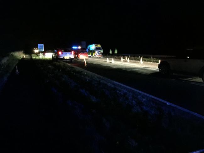 A pedestrian has been killed after being hit by a car as they crossed the A64.