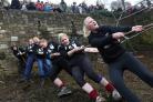 Members of the ladies team from the Mother Shipton’s Inn in action at the tug of war event over the River Nidd at Knaresborough.  Picture: Richard Doughty Photography