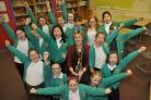 Members of the school choir from Osbaldwick Primary School with head teacher Lesley Barringer after the school’s latest Ofsted report