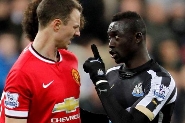 POINTED EXCHANGE: Papiss Cisse, right, remonstrates with Jonny Evans at the Spitgate at Gallowgate inciden