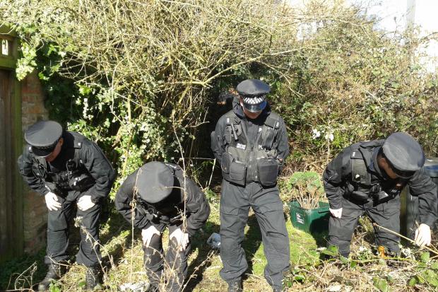 Police carry out a search of the alleyway behind Claudia Lawrence’s home in Heworth, York