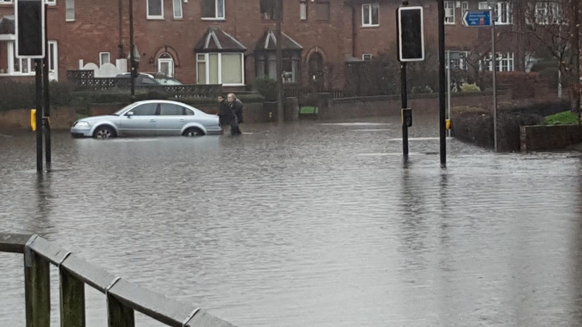 Flooding in Water Lane, Clifton. Photo: Steve Carroll