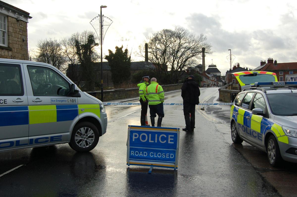 Police guard the closed bridge over the River Wharfe in Tadcaster. Photo Wendy Binns