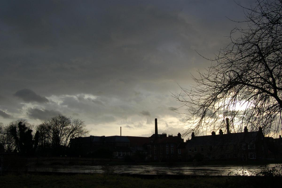 Tadcaster silhouetted on a flooded River Wharfe. Photo: Wendy Binns