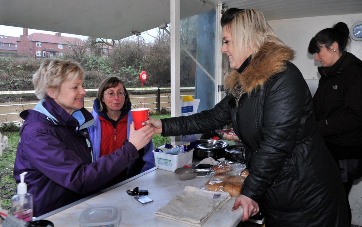 Jade Robinson from Rawcliffe  (left) and Helen Cullen who volunteered to provide flood hit families in the Huntington Rd area with free donated hot drinks and bacon butties from a donated snack van