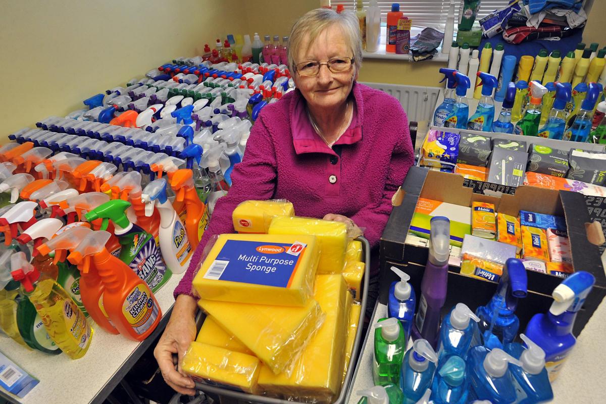 Rosie Wall with donated items at the Sanderson Court community house in Chapelfields