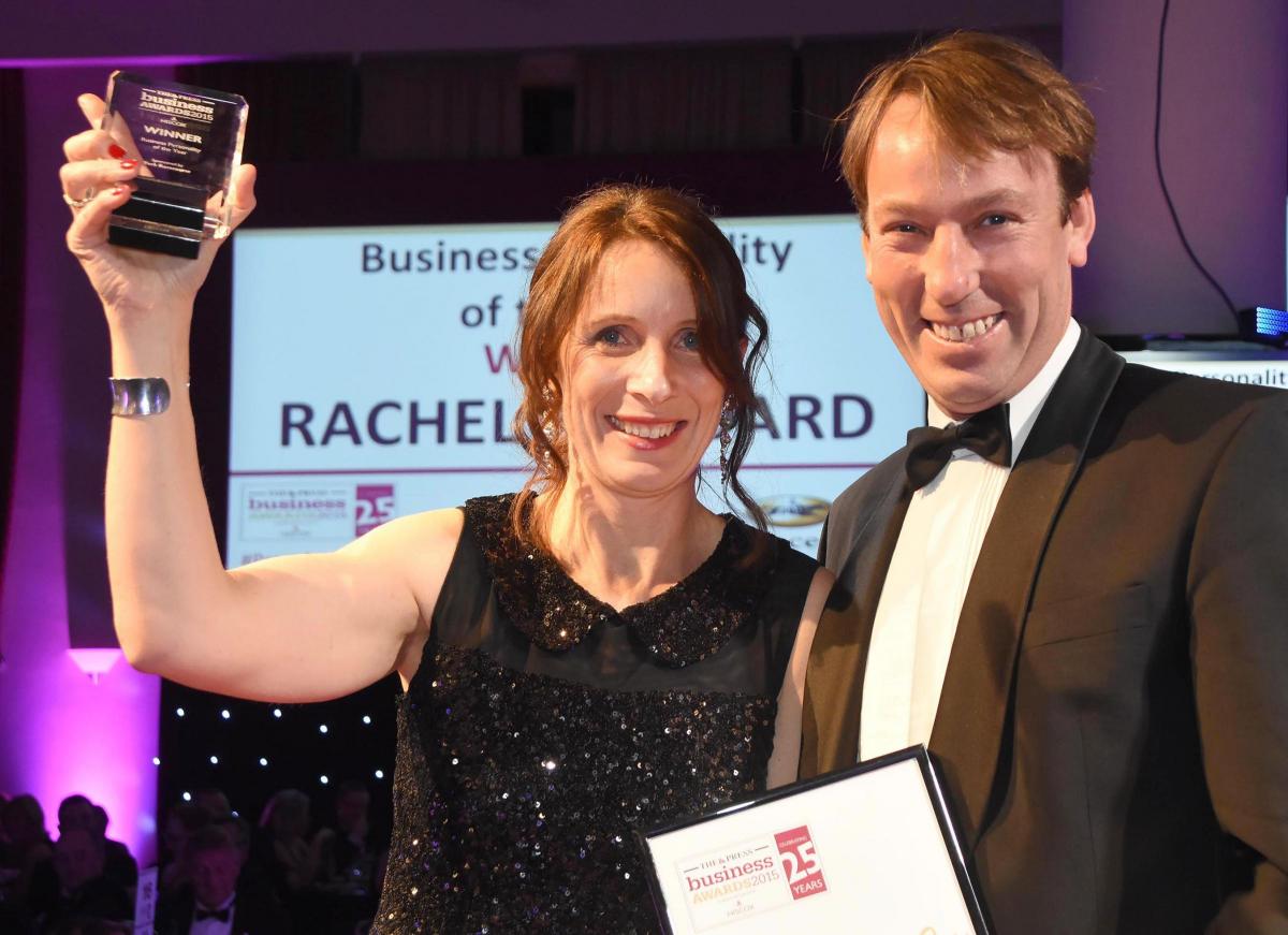 The Press Business Awards 2015. Business Personality of the Year Award winner Rachel Goddard receives the award from William Derby Chief Executive and Clerk of York Racecourse. Picture David Harrison.