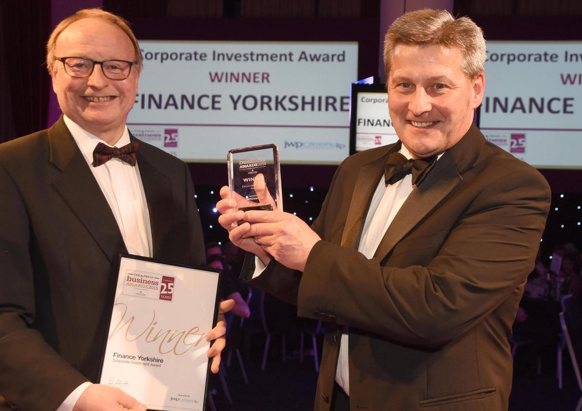 The Press Business Awards 2015. Corporate Investment Award winner Finance Yorkshire. Alex McWirter receives the award from Tony Farmer of JWPCreers. Picture David Harrison.