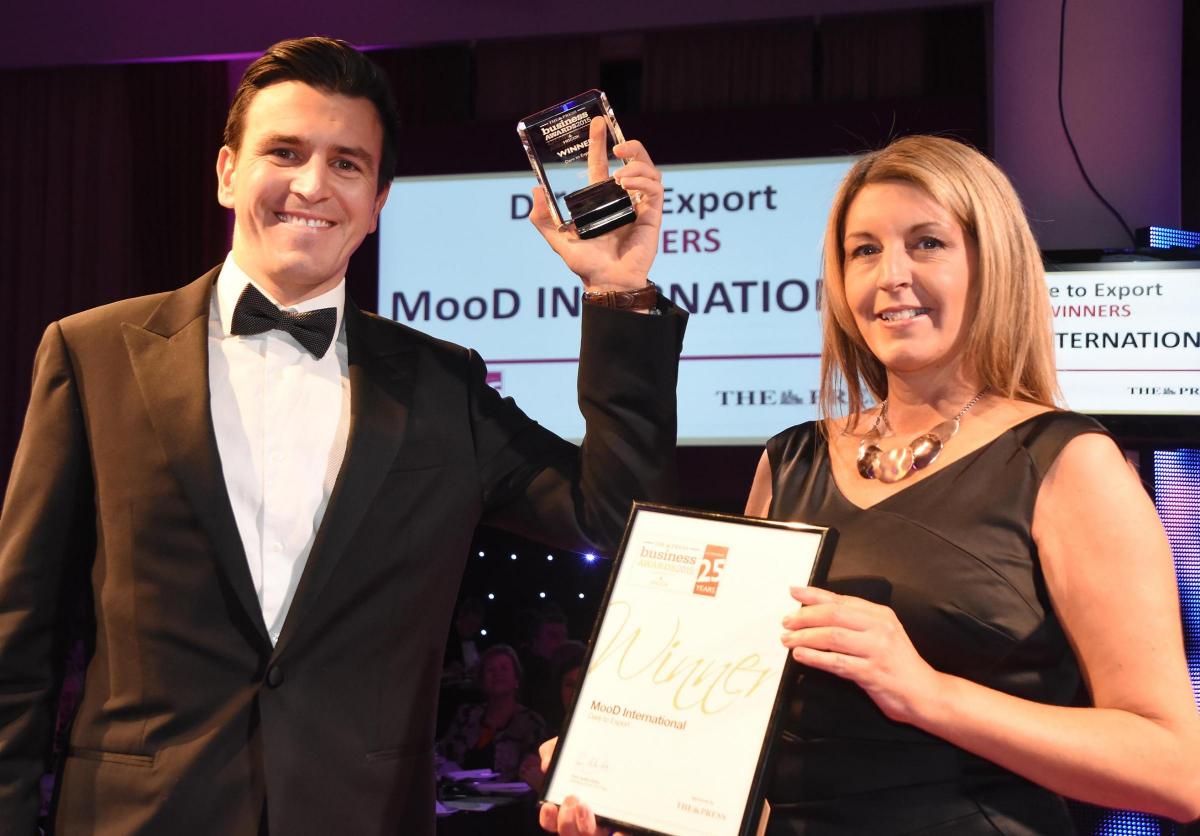 The Press Business Awards 2015. Dare To Export Award winner MooD International. Nick Cowlen receives the award from Jane Hanson from The Press. Picture David Harrison.