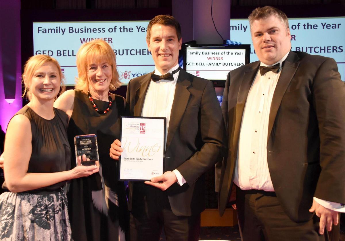 The Press Business Awards 2015. Family Business of the Year Award winner Ged Bell Family Butchers. Deb, Lynn and Lee Bell receive the award from Cllr Chris Steward from City of York Council. Picture David Harrison.