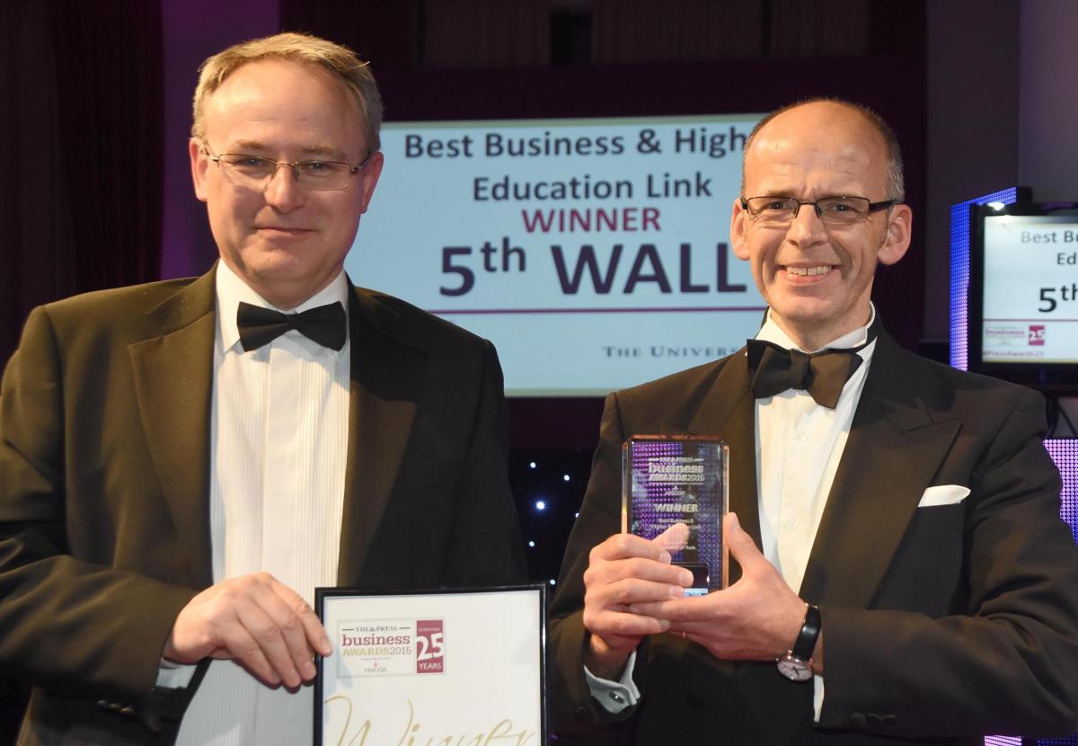 The Press Business Awards 2015. Best Business and Higher Education Link Award winner 5th Wall. Patrick Holtby receives the award from Andrew Ferguson of the University of York. Picture David Harrison.