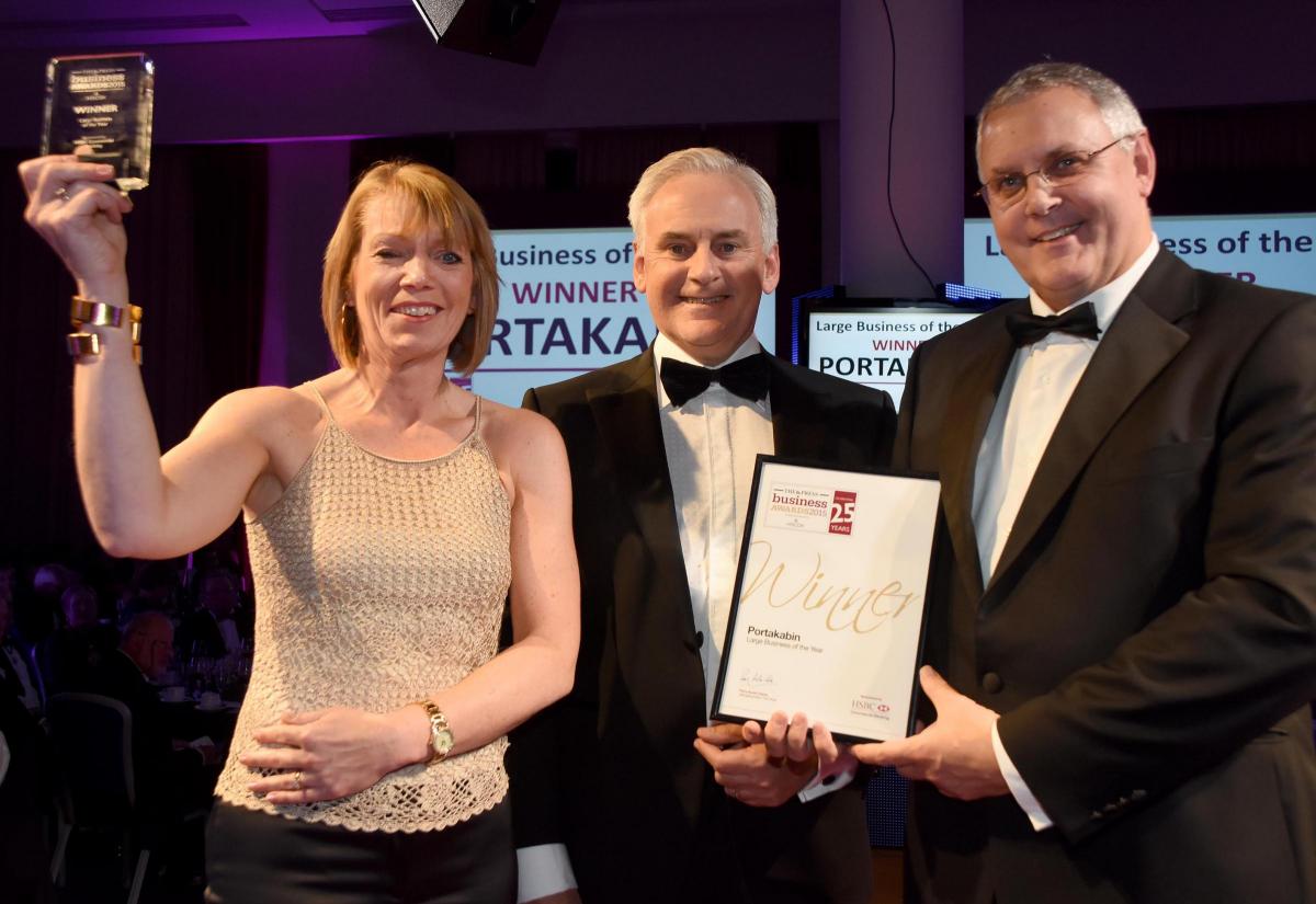 The Press Business Awards 2015. Large Business of the Year Award winner Portakabin. Amanda Stainton and Derek Carlton receive the award from Jonathan Rutter of HSBC Commercial Banking. Picture David Harrison.