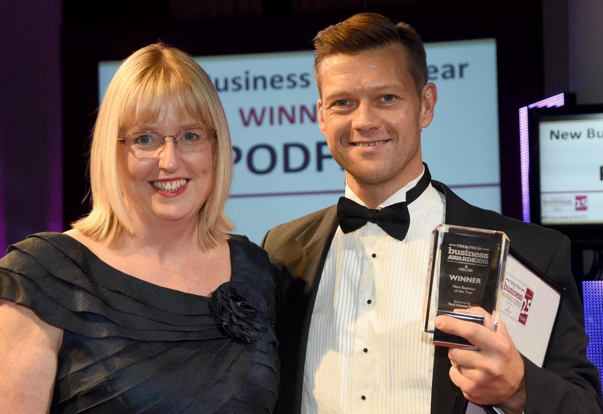 The Press Business Awards 2015. New Business of the Year Award winner Podfit. Neil Owen receives the award from Tracey Smith of York Science Park. Picture David Harrison.