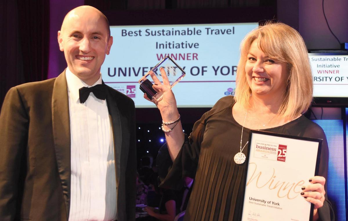The Press Business Awards 2015. Best Sustainable Travel Initiative winner University of York. Fiona Macey receives the award from Andrew Bradley of iTravel York. Picture David Harrison.