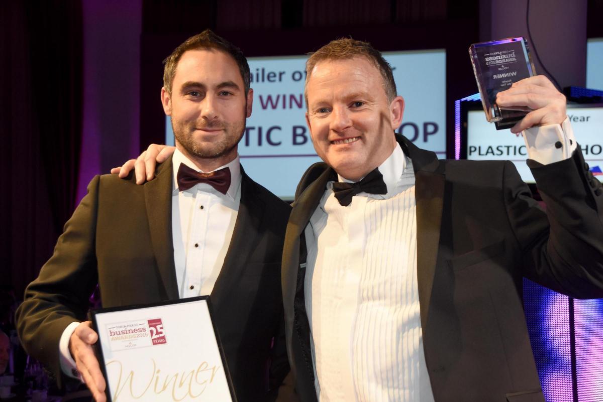 The Press Business Awards 2015. Retailer of the Year Award winner PlasticBoxShop. Gary Lyons receives the award from Paul Tyler of York Designer Outlet. Picture David Harrison.