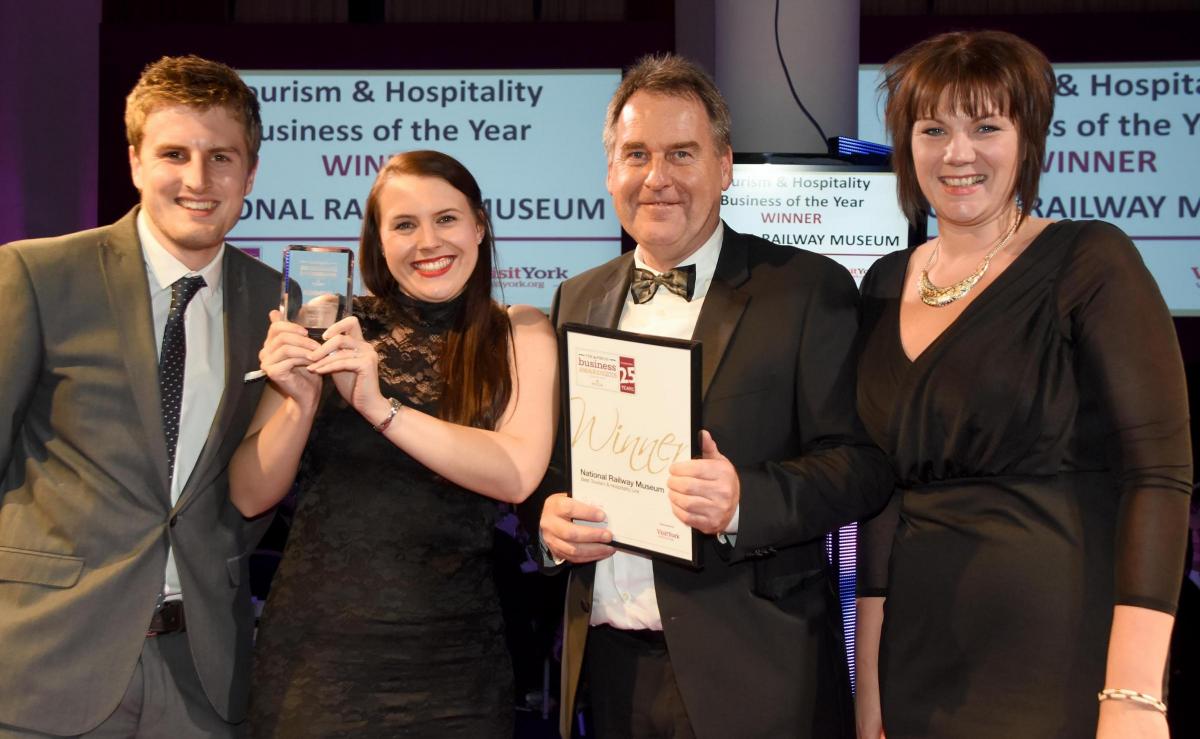 The Press Business Awards 2015. Tourism & Hospitality Business of the Year Award winner the National Railway Museum. Rob Noonam, Charlotte Scott and Michelle Rennoldson receive the award from Steve Brown, second right, of Visit York. Picture David Harriso