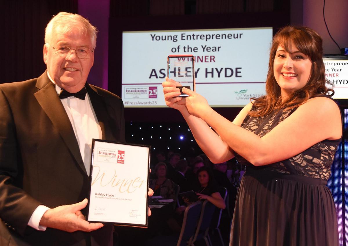 The Press Business Awards 2015. Young Entrpreneur of the Year Award winner Ashley Hyde receives the award from David Chesser from York St John University. Picture David Harrison.