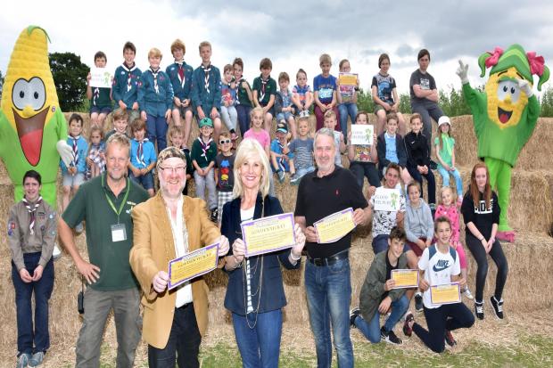Over 100 children who were involved with the flood recovery, pictured at York Maze with maze owner Tom Pearcy, Lord Mayor of York Cllr Dave Taylor and Lady Mayoress Susan Ridley