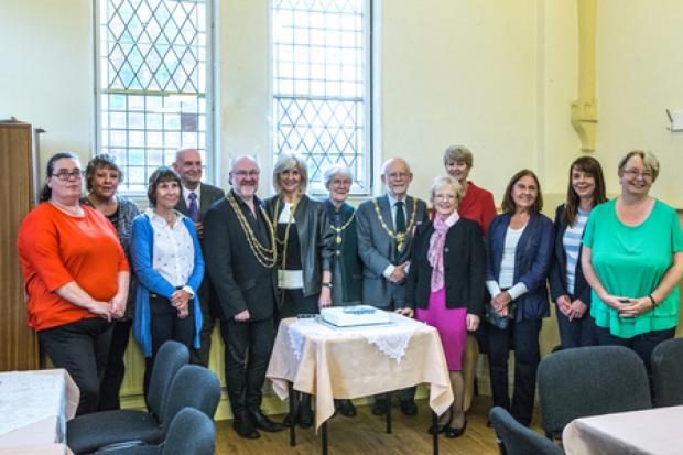 The civic party pictured with centre trustees and staff members at the hall's anniversary celebration