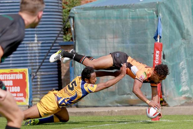 TREBLE YELL: Hemel Stags' Darren Forde can't stop York City Knights winger Dee Foggin-Johnston from spectacularly scoring in the corner for his second hat-trick in consecutive matches last month. Picture: Gordon Clayton