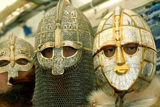 Members of the Jorvik Viking group in battle helmets before their display
