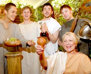 Linda Cummings, owner of Bobo Lobo, and, from left, Matthew Edwards and Oliver Couttie, of Kennedy’s, Toby Gordon (Stonegate Yard) and Jonathan Smales (Evil Eye Lounge) get in the  mood for the Roman food and drink trail