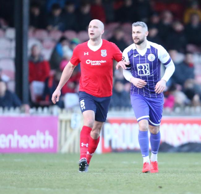 CENTRAL STATION: On-loan York City defender David Mirfin keeps an eye on former Bootham Crescent forward Jamie Reed after switching to a central-defensive position in a back four against Ashton United. Picture: Gordon Clayton