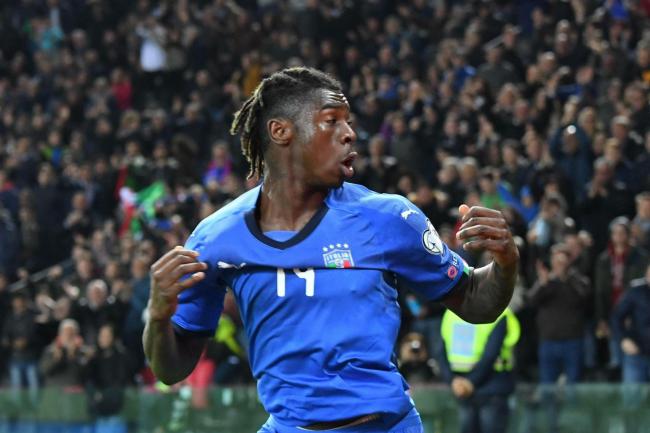 Moise Kean celebrates after scoring his side’s second goal against Finland